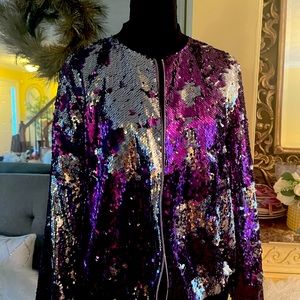 This is a multicolor silver and purple sequence bomber jacket